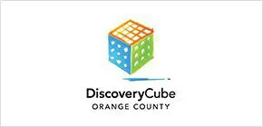 A logo of discovery cube orange county.